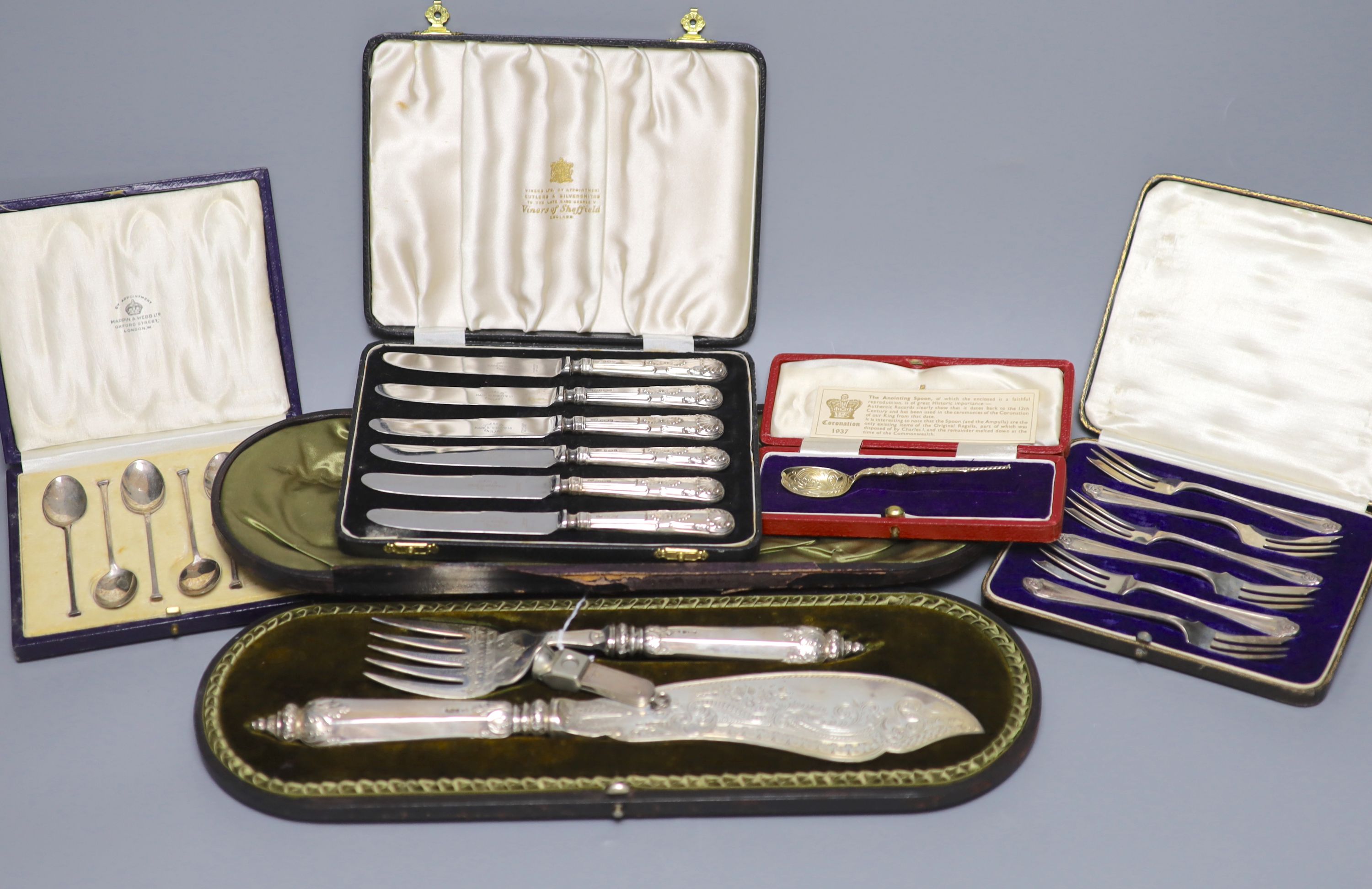 Mixed silver including cased pair of late Victorian silver fish servers, four other cased sets and a silver mounted cigar cutter.